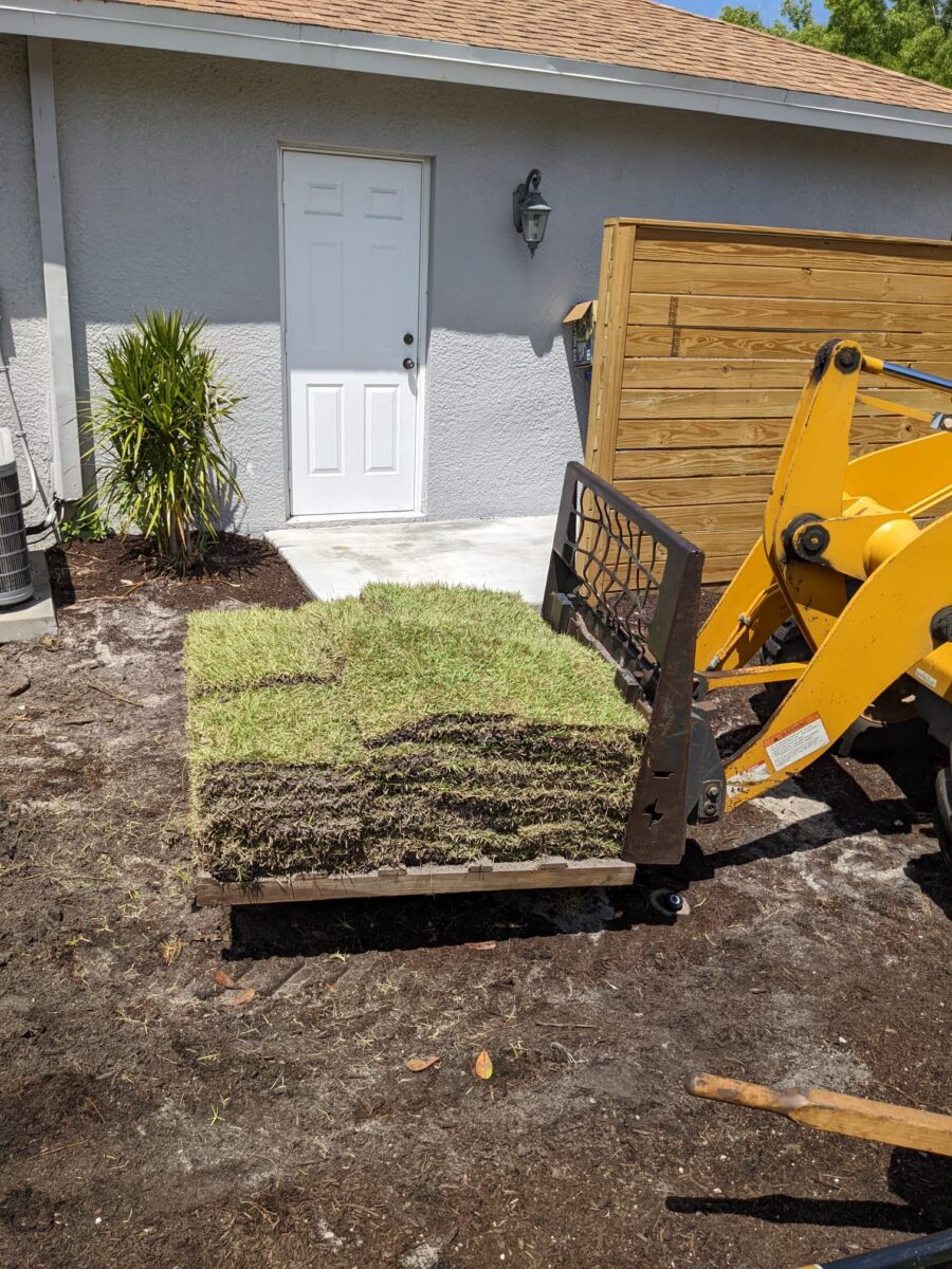 pallets of sod on machinery equipment